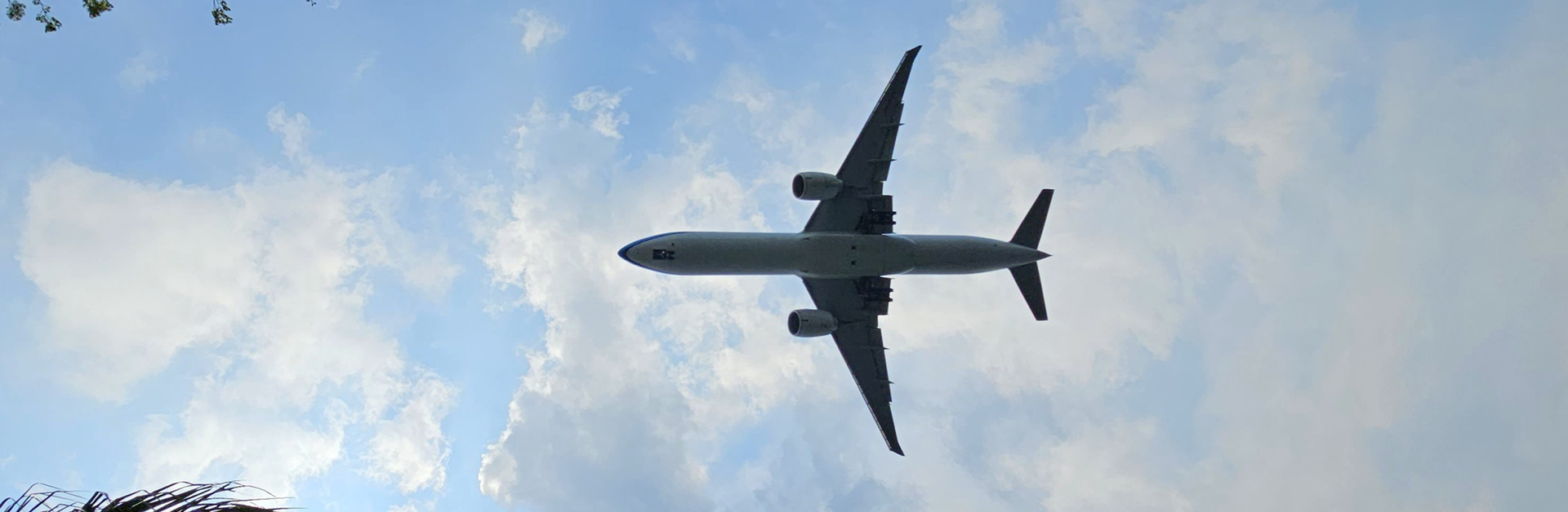 Underside view of airplane in flight